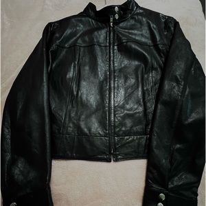 Womens Black Leather Jacket full zipper & snaps. Sits at hip. worn 2-3 times